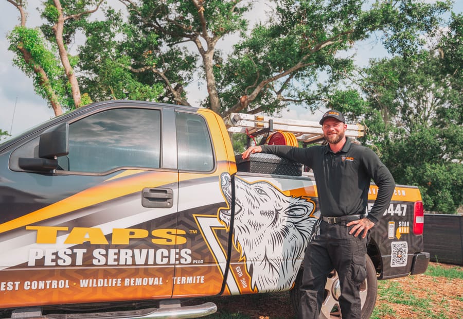 Taps technician with the branded service truck in Tampa, FL