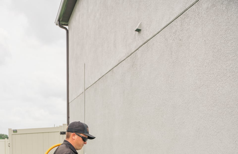Taps Pest Services technician providing pest control in New Port Richey, FL