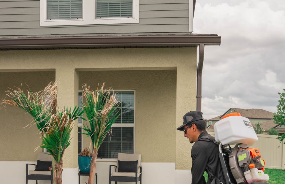Taps Pest Services technician providing pest control in Holiday, FL