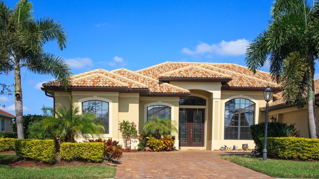 Pest Control In Apollo Beach Front view of a residential home in Apollo Beach, Florida, highlighting the need for expert pest control services to protect against termites, mosquitoes, and rodents.